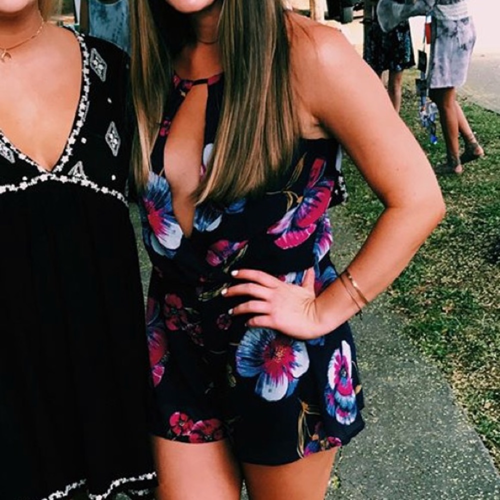 Floral open chest romper. Blue